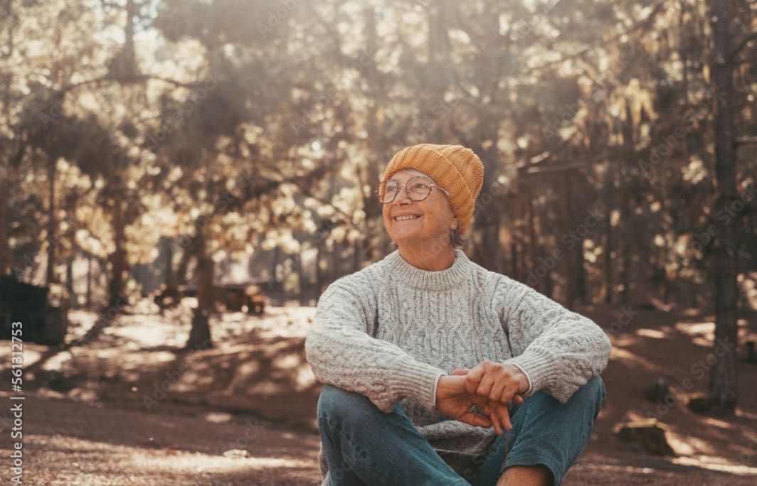 Older woman sitting in park