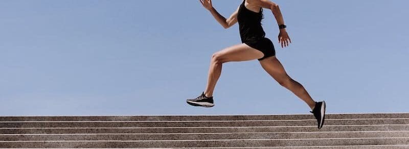 Woman Running on the Stairs