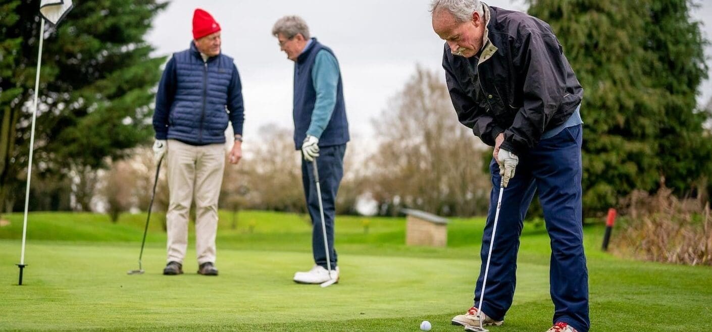 Elderly Men Playing Golf